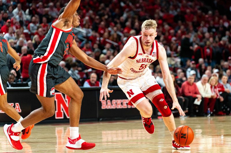 Jan 23, 2024; Lincoln, Nebraska, USA; Nebraska Cornhuskers forward Rienk Mast (51) drives against Ohio State Buckeyes forward Zed Key (23) during the first half at Pinnacle Bank Arena. Mandatory Credit: Dylan Widger-USA TODAY Sports