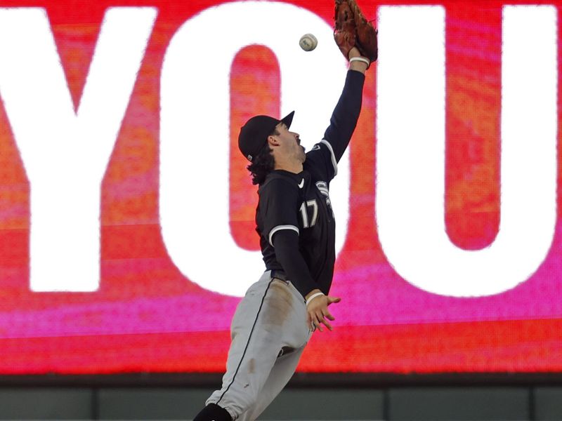 Apr 24, 2024; Minneapolis, Minnesota, USA; Chicago White Sox shortstop Braden Shewmake (17) leaps but misses a single by Minnesota Twins catcher Christian Vazquez (not pictured) in the fifth inning at Target Field. Mandatory Credit: Bruce Kluckhohn-USA TODAY Sports