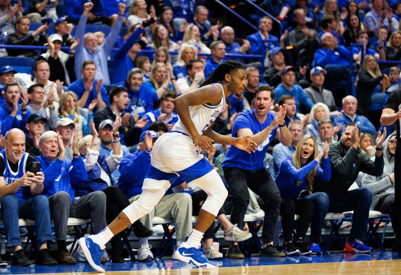 Dec 31, 2022; Lexington, Kentucky, USA; Kentucky Wildcats fans cheer after Cason Wallace (22) makes a three point basket during the second half against the Louisville Cardinals at Rupp Arena at Central Bank Center. Mandatory Credit: Jordan Prather-USA TODAY Sports