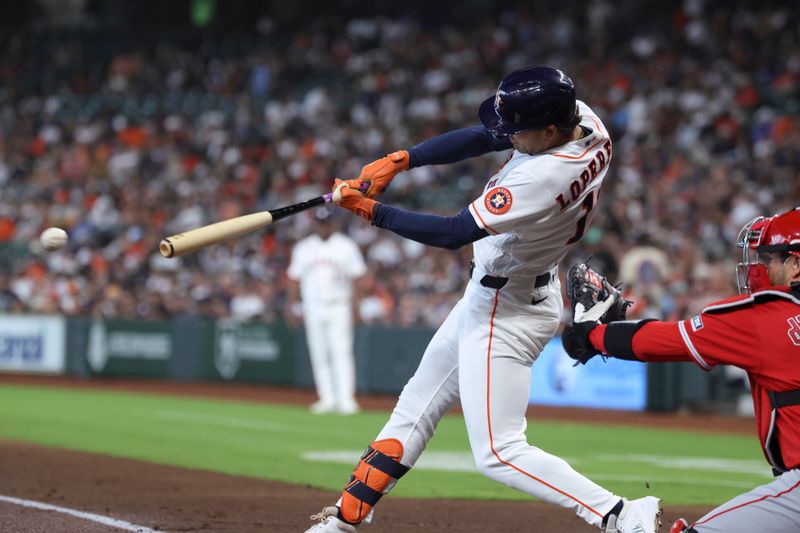 Mar 29, 2026; Houston, Texas, USA; Houston Astros left fielder Shay Whitcomb (10) hits a double during the second inning against the Los Angeles Angels at Daikin Park. Mandatory Credit: Troy Taormina-Imagn Images