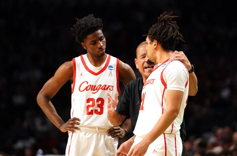 Mar 18, 2023; Birmingham, AL, USA; Houston Cougars head coach Kelvin Sampson talks with guard Emanuel Sharp (21) and guard Terrance Arceneaux (23) during the second half against the Auburn Tigers at Legacy Arena. Mandatory Credit: Marvin Gentry-USA TODAY Sports