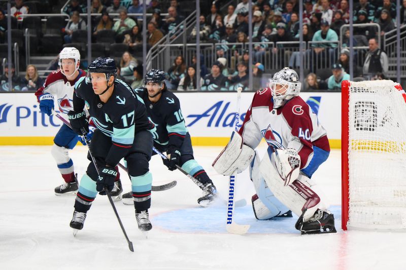 Nov 13, 2023; Seattle, Washington, USA; Colorado Avalanche goaltender Alexandar Georgiev (40) defends the goal from Seattle Kraken center Jaden Schwartz (17) and center Matty Beniers (10) during the second period at Climate Pledge Arena. Mandatory Credit: Steven Bisig-USA TODAY Sports