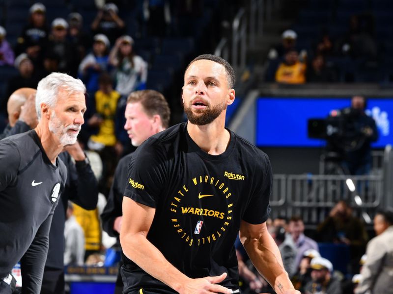 PHOENIX, AZ - NOVEMBER 12: Stephen Curry #30 of the Golden State Warriors warms up before the game against the Dallas Mavericks during the Emirates NBA Cup game on November 12, 2024 at Footprint Center in Phoenix, Arizona. NOTE TO USER: User expressly acknowledges and agrees that, by downloading and or using this photograph, user is consenting to the terms and conditions of the Getty Images License Agreement. Mandatory Copyright Notice: Copyright 2024 NBAE (Photo by Barry Gossage/NBAE via Getty Images)