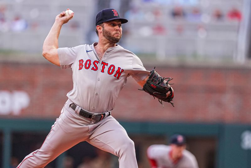 May 7, 2024; Cumberland, Georgia,USA; Boston Red Sox starting pitcher Kutter Crawford (50) pitches against the Atlanta Braves during the first inning at Truist Park. Mandatory Credit: Dale Zanine-USA TODAY Sports