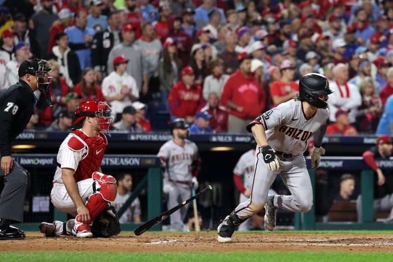 Oct 24, 2023; Philadelphia, Pennsylvania, USA; Arizona Diamondbacks left fielder Corbin Carroll (7) hits a single against the Philadelphia Phillies in the third inning for game seven of the NLCS for the 2023 MLB playoffs at Citizens Bank Park. Mandatory Credit: Bill Streicher-USA TODAY Sports