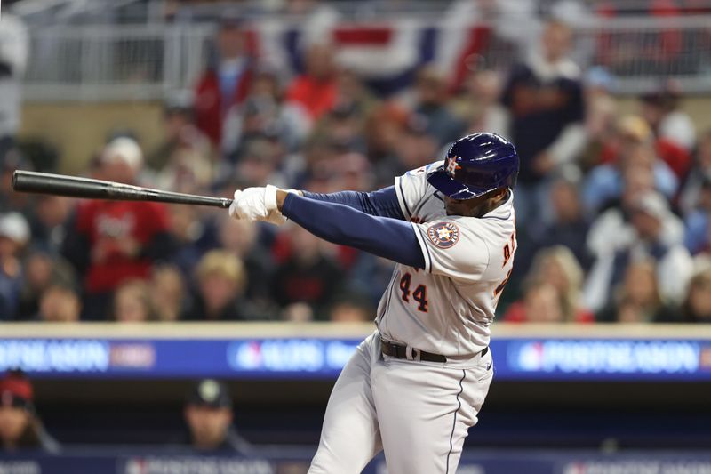 Oct 11, 2023; Minneapolis, Minnesota, USA; Houston Astros left fielder Yordan Alvarez (44) hits a single in the fourth inning against the Minnesota Twins during game four of the ALDS for the 2023 MLB playoffs at Target Field. Mandatory Credit: Jesse Johnson-USA TODAY Sports