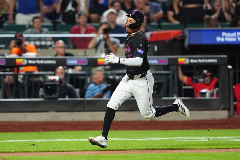 Jul 10, 2024; New York City, New York, USA; New York Mets third baseman Mark Vientos (27) scores a run against the Washington Nationals during the sixth inning at Citi Field. Mandatory Credit: Gregory Fisher-USA TODAY Sports