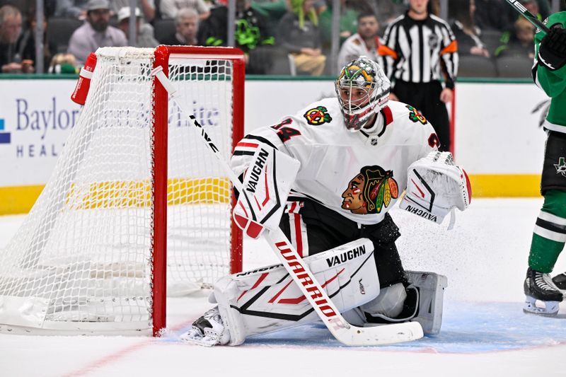 Oct 26, 2024; Dallas, Texas, USA; Chicago Blackhawks goaltender Petr Mrazek (34) faces the Dallas Stars attack during the second period at the American Airlines Center. Mandatory Credit: Jerome Miron-Imagn Images