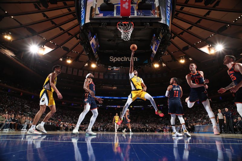 NEW YORK, NY - FEBRUARY 1: Myles Turner #33 of the Indiana Pacers drives to the basket during the game against the New York Knicks on February 1, 2024 at Madison Square Garden in New York City, New York.  NOTE TO USER: User expressly acknowledges and agrees that, by downloading and or using this photograph, User is consenting to the terms and conditions of the Getty Images License Agreement. Mandatory Copyright Notice: Copyright 2024 NBAE  (Photo by Nathaniel S. Butler/NBAE via Getty Images)