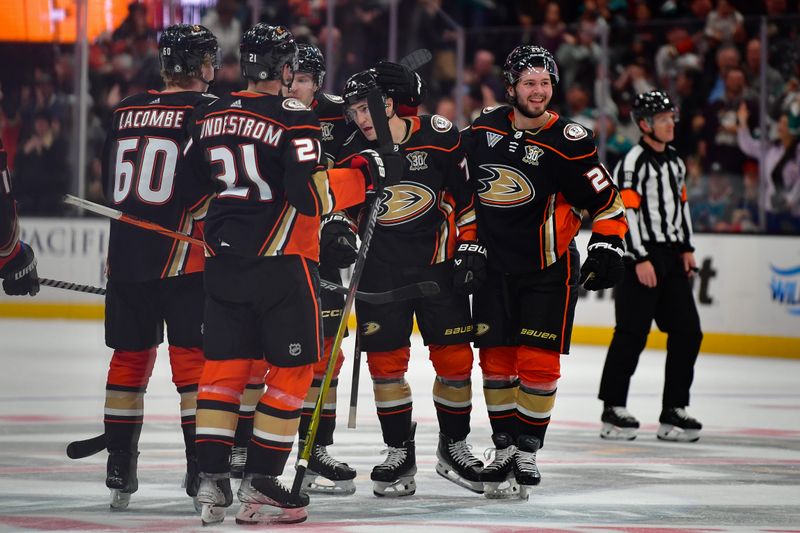 Jan 31, 2024; Anaheim, California, USA; Anaheim Ducks right wing Frank Vatrano (77) celebrtes his goal scored for the victory against the San Jose Sharks in the overtime period at Honda Center. Mandatory Credit: Gary A. Vasquez-USA TODAY Sports