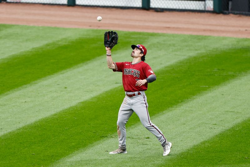 Sep 28, 2023; Chicago, Illinois, USA; Arizona Diamondbacks left fielder Corbin Carroll (7) catches a fly ball hit by Chicago White Sox designated hitter Eloy Jimenez (not pictured) during the third inning at Guaranteed Rate Field. Mandatory Credit: Kamil Krzaczynski-USA TODAY Sports