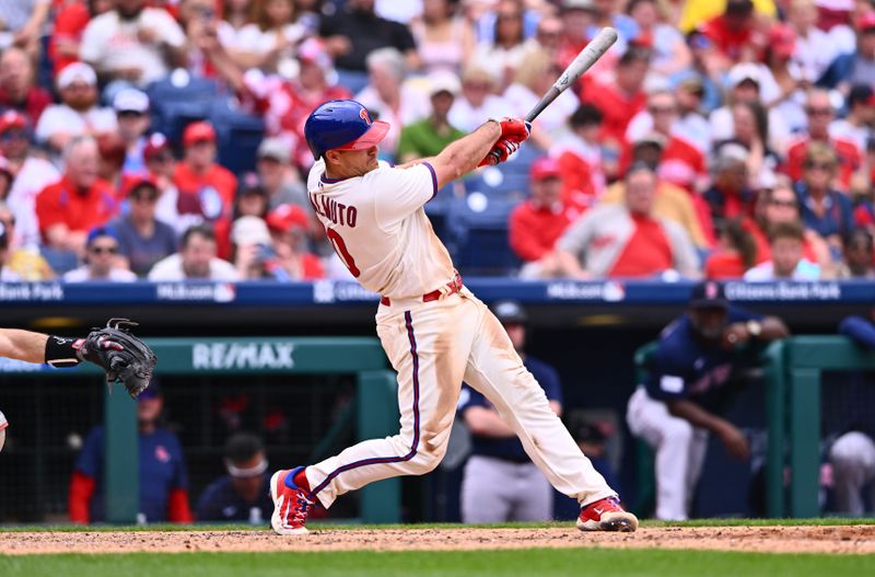 May 7, 2023; Philadelphia, Pennsylvania, USA; Philadelphia Phillies catcher J.T. Realmuto (10) hits an RBI single against the Boston Red Sox in the eighth inning at Citizens Bank Park. Mandatory Credit: Kyle Ross-USA TODAY Sports