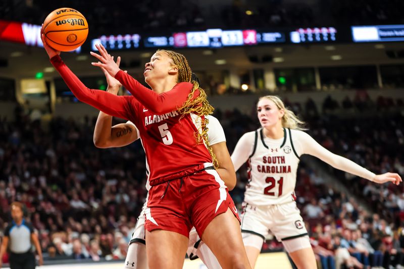 Feb 22, 2024; Columbia, South Carolina, USA; Alabama Crimson Tide guard Reychel Douglas (5) drives against the South Carolina Gamecocks in the second half at Colonial Life Arena. Mandatory Credit: Jeff Blake-USA TODAY Sports