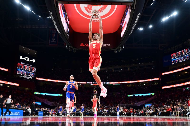 ATLANTA, GA - November 6:  Dyson Daniels #5 of the Atlanta Hawks dunks the ball during the game against the New York Knicks on November 6, 2024 at State Farm Arena in Atlanta, Georgia.  NOTE TO USER: User expressly acknowledges and agrees that, by downloading and/or using this Photograph, user is consenting to the terms and conditions of the Getty Images License Agreement. Mandatory Copyright Notice: Copyright 2024 NBAE (Photo by Adam Hagy/NBAE via Getty Images)