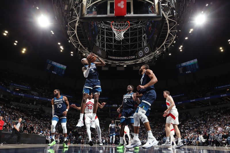 MINNEAPOLIS, MN -  OCTOBER 26: Jaden McDaniels #3 of the Minnesota Timberwolves goes up for the rebound during the game against the Toronto Raptors on October 26, 2024 at Target Center in Minneapolis, Minnesota. NOTE TO USER: User expressly acknowledges and agrees that, by downloading and or using this Photograph, user is consenting to the terms and conditions of the Getty Images License Agreement. Mandatory Copyright Notice: Copyright 2024 NBAE (Photo by David Sherman/NBAE via Getty Images)