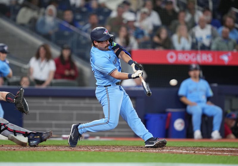 May 11, 2024; Toronto, Ontario, CAN; Toronto Blue Jays outfielder Davis Schneider (36) gets out but scores an RBI against the Minnesota Twins during the seventh  inning at Rogers Centre. Mandatory Credit: Nick Turchiaro-USA TODAY Sports