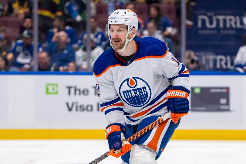 May 20, 2024; Vancouver, British Columbia, CAN; Edmonton Oilers forward Zach Hyman (18) skates against the Vancouver Canucks during the second period in game seven of the second round of the 2024 Stanley Cup Playoffs at Rogers Arena. Mandatory Credit: Bob Frid-USA TODAY Sports