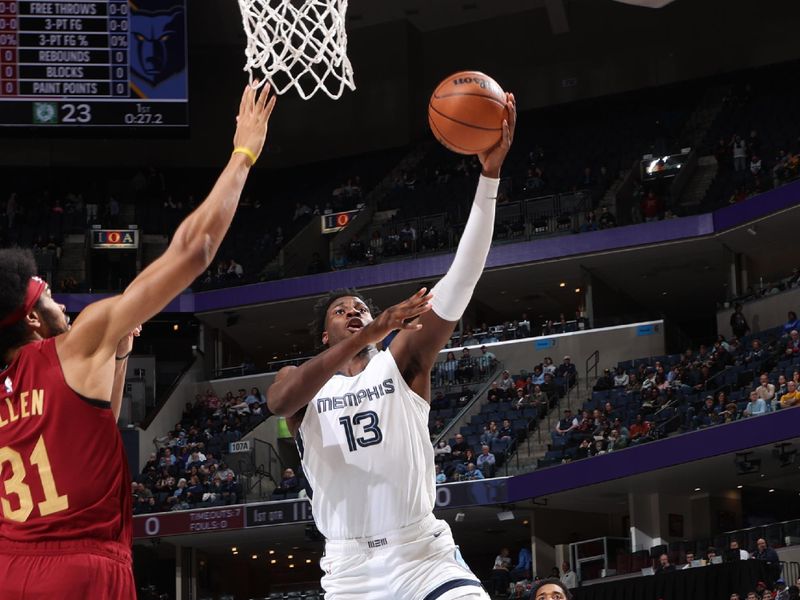 MEMPHIS, TN - FEBRUARY 1:  Jaren Jackson Jr. #13 of the Memphis Grizzlies drives to the basket during the game  against the Cleveland Cavaliers on February 1, 2024 at FedExForum in Memphis, Tennessee. NOTE TO USER: User expressly acknowledges and agrees that, by downloading and or using this photograph, User is consenting to the terms and conditions of the Getty Images License Agreement. Mandatory Copyright Notice: Copyright 2024 NBAE (Photo by Joe Murphy/NBAE via Getty Images)