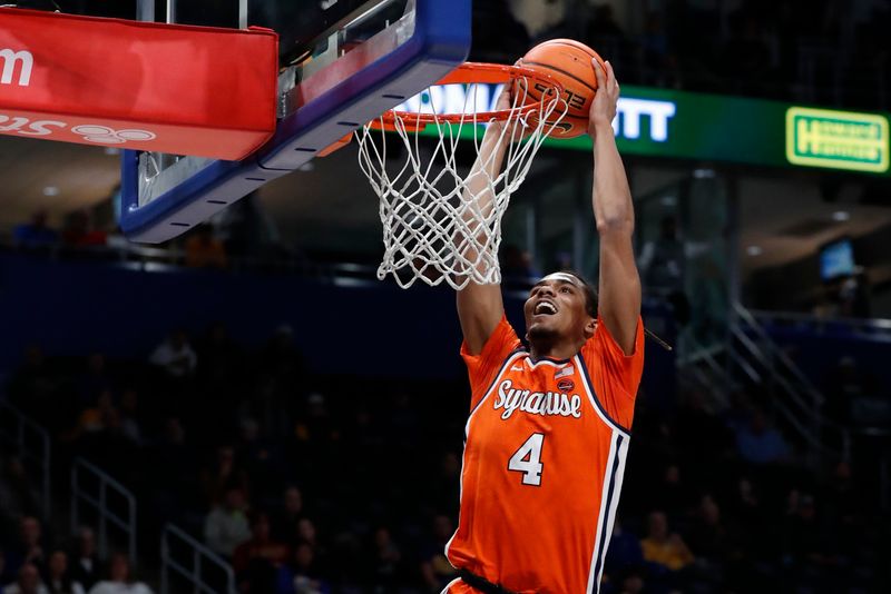 Jan 16, 2024; Pittsburgh, Pennsylvania, USA; Syracuse Orange forward Chris Bell (4) dunks the ball on a breakaway against the Pittsburgh Panthers during the first half at the Petersen Events Center. Mandatory Credit: Charles LeClaire-USA TODAY Sports