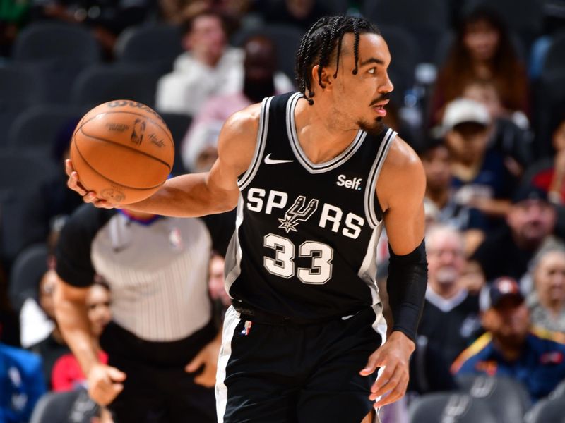 SAN ANTONIO, TX - FEBRUARY 2: Tre Jones #33 of the San Antonio Spurs dribbles the ball during the game against the New Orleans Pelicans on February 2, 2024 at the Frost Bank Center in San Antonio, Texas. NOTE TO USER: User expressly acknowledges and agrees that, by downloading and or using this photograph, user is consenting to the terms and conditions of the Getty Images License Agreement. Mandatory Copyright Notice: Copyright 2024 NBAE (Photos by Barry Gossage/NBAE via Getty Images)