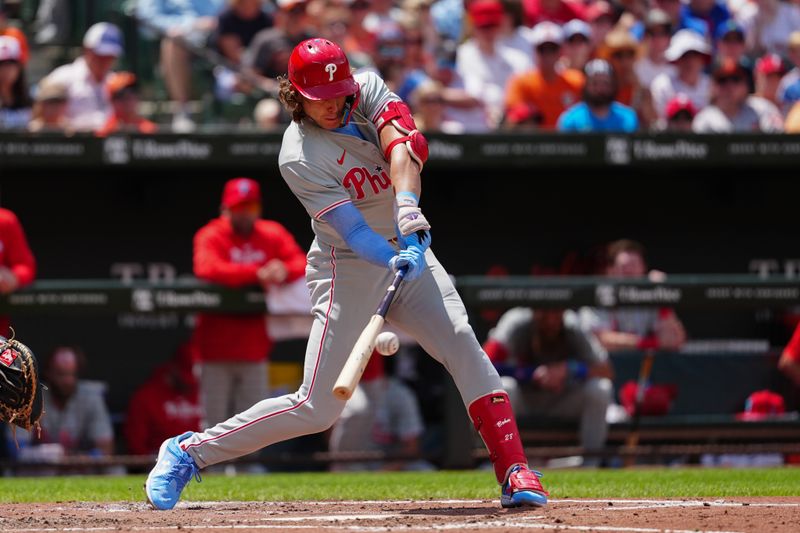 Jun 16, 2024; Baltimore, Maryland, USA; Philadelphia Phillies third baseman Alec Bohm (28) hits a single against the Baltimore Orioles during the fourth inning at Oriole Park at Camden Yards. Mandatory Credit: Gregory Fisher-USA TODAY Sports