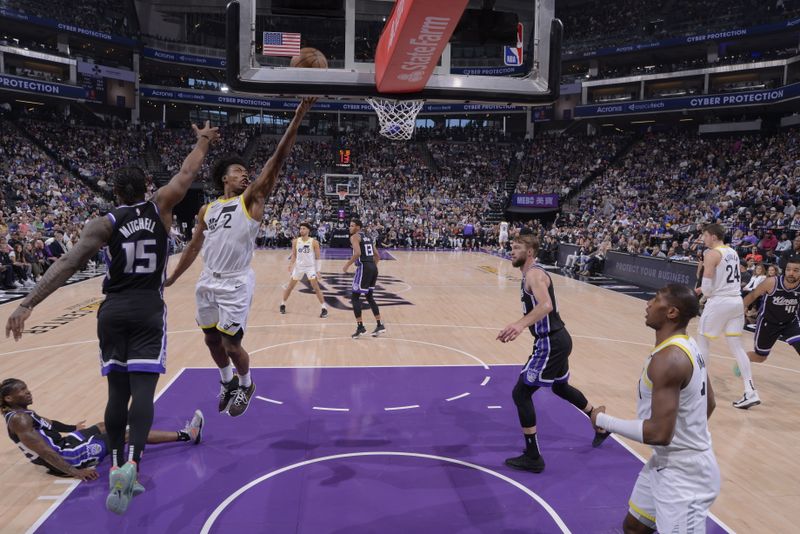 SACRAMENTO, CA - MARCH 31: Colin Sexton #2 of the Utah Jazz drives to the basket during the game against the Sacramento Kings on March 31, 2024 at Golden 1 Center in Sacramento, California. NOTE TO USER: User expressly acknowledges and agrees that, by downloading and or using this Photograph, user is consenting to the terms and conditions of the Getty Images License Agreement. Mandatory Copyright Notice: Copyright 2024 NBAE (Photo by Rocky Widner/NBAE via Getty Images)