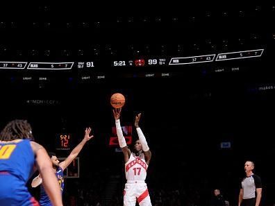 TORONTO, CANADA - DECEMBER 20:  Dennis Schroder #17 of the Toronto Raptors shoots a three point basket during the game  on December 20, 2023 at the Scotiabank Arena in Toronto, Ontario, Canada.  NOTE TO USER: User expressly acknowledges and agrees that, by downloading and or using this Photograph, user is consenting to the terms and conditions of the Getty Images License Agreement.  Mandatory Copyright Notice: Copyright 2023 NBAE (Photo by Mark Blinch/NBAE via Getty Images)