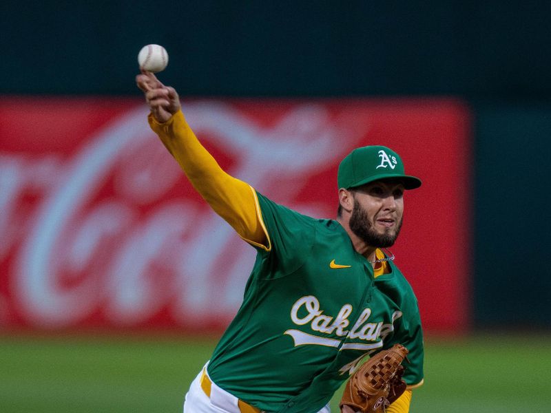 Sep 24, 2024; Oakland, California, USA; Oakland Athletics starting pitcher Mitch Spence (40) delivers a pitch against the Texas Rangers during the first inning at Oakland-Alameda County Coliseum. Mandatory Credit: Neville E. Guard-Imagn Images