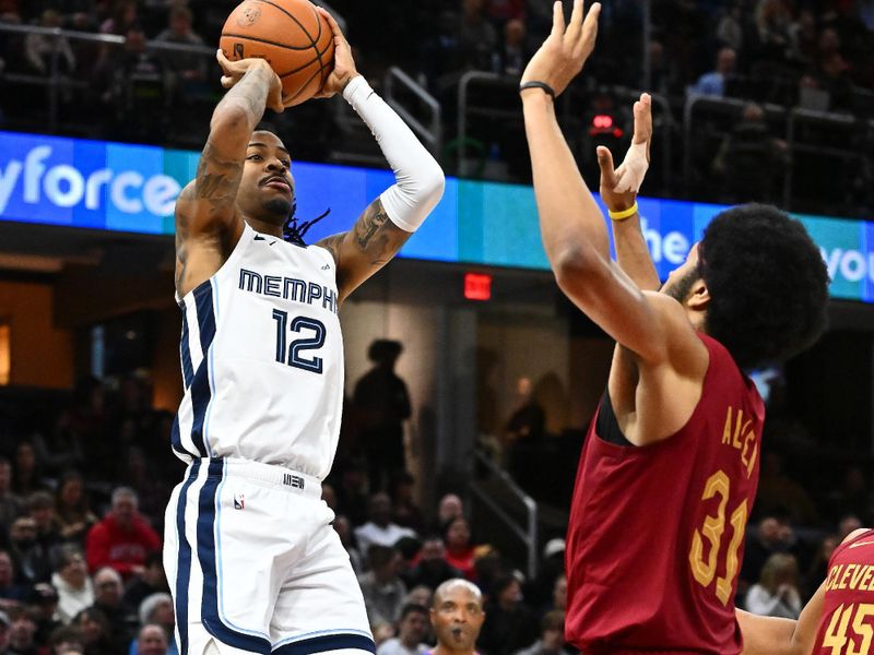 CLEVELAND, OHIO - FEBRUARY 23: Ja Morant #12 of the Memphis Grizzlies shoots over Jarrett Allen #31 of the Cleveland Cavaliers during the fourth quarter at Rocket Arena on February 23, 2025 in Cleveland, Ohio. The Cavaliers defeated the Grizzlies 129-123. NOTE TO USER: User expressly acknowledges and agrees that, by downloading and or using this photograph, User is consenting to the terms and conditions of the Getty Images License Agreement. (Photo by Jason Miller/Getty Images)