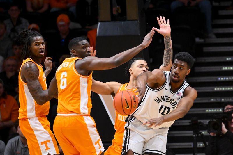 Feb 21, 2026; Nashville, Tennessee, USA;  Vanderbilt Commodores forward Ak Okereke (10) passes out of a double team from Tennessee Volunteers forward Dewayne Brown II (6) and guard Ja'kobi Gillespie (0)  during the first half at Memorial Gymnasium. Mandatory Credit: Steve Roberts-Imagn Images