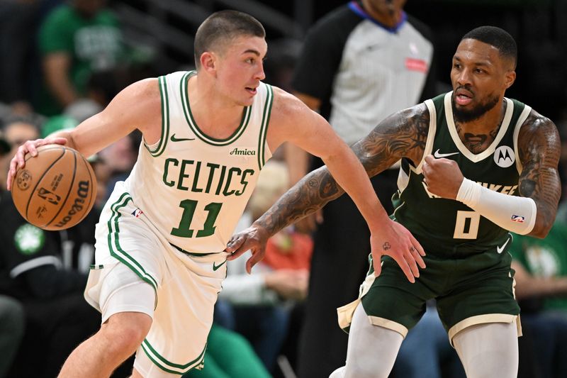 BOSTON, MASSACHUSETTS - OCTOBER 28: Payton Pritchard #11 of the Boston Celtics drives to the basket against Damian Lillard #0 of the Milwaukee Bucks during the first half at the TD Garden on October 28, 2024 in Boston, Massachusetts. NOTE TO USER: User expressly acknowledges and agrees that, by downloading and or using this photograph, User is consenting to the terms and conditions of the Getty Images License Agreement. (Photo by Brian Fluharty/Getty Images)