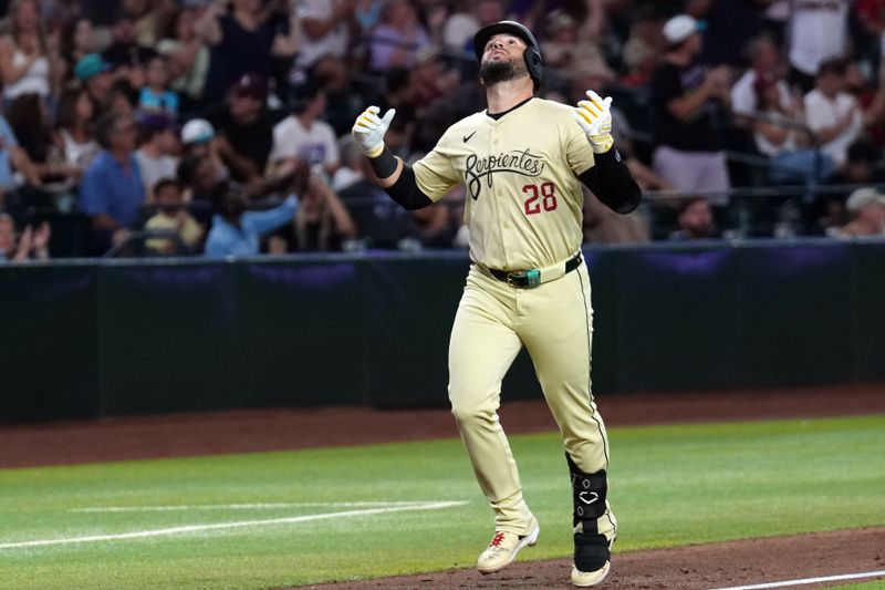 Jul 30, 2024; Phoenix, Arizona, USA; Arizona Diamondbacks third base Eugenio Suárez (28) runs the bases after hitting a home run against the Washington Nationals during the sixth inning at Chase Field. Mandatory Credit: Joe Camporeale-USA TODAY Sports