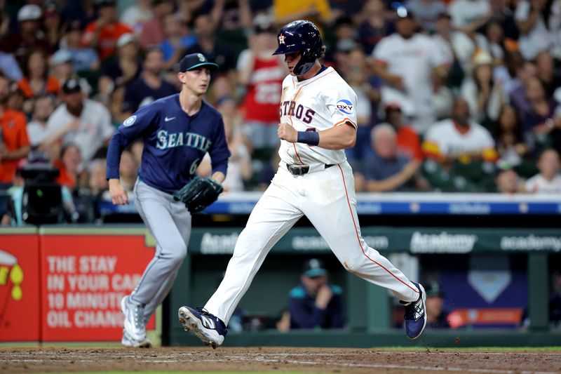 May 22, 2025; Houston, Texas, USA; Houston Astros center fielder Jake Meyers (6) crosses home plate to score a run against the Seattle Mariners during the fourth inning at Daikin Park. Mandatory Credit: Erik Williams-Imagn Images