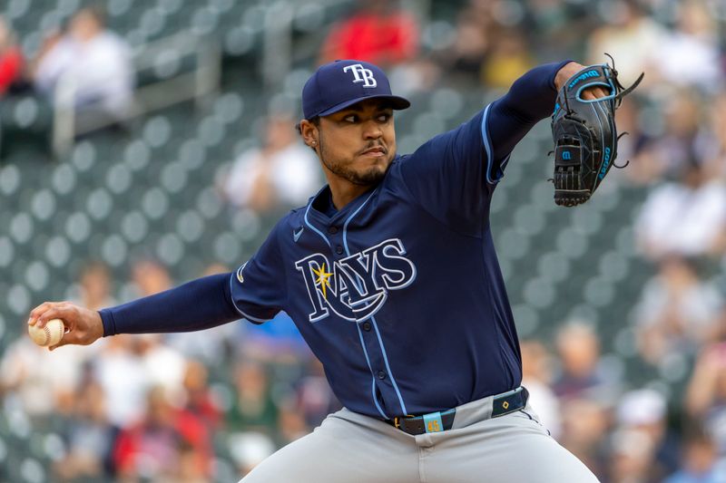 Jun 19, 2024; Minneapolis, Minnesota, USA; Tampa Bay Rays starting pitcher Taj Bradley (45) delivers a pitch against the Minnesota Twins in the first inning at Target Field. Mandatory Credit: Jesse Johnson-USA TODAY Sports