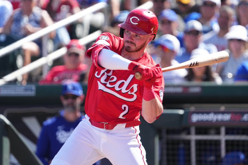 Feb 24, 2025; Goodyear, Arizona, USA; Cincinnati Reds second base Gavin Lux (2) bats against the Los Angeles Dodgers during the second inning at Goodyear Ballpark. Mandatory Credit: Joe Camporeale-Imagn Images