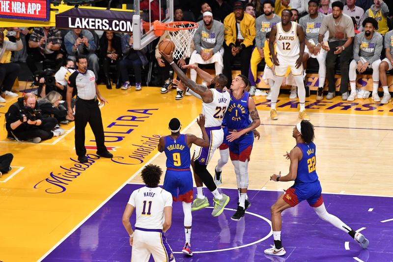 LOS ANGELES, CA - MARCH 2: LeBron James #23 of the Los Angeles Lakers scores his 40,000 career point during the game against the Denver Nuggets on March 2, 2024 at Crypto.Com Arena in Los Angeles, California. NOTE TO USER: User expressly acknowledges and agrees that, by downloading and/or using this Photograph, user is consenting to the terms and conditions of the Getty Images License Agreement. Mandatory Copyright Notice: Copyright 2024 NBAE (Photo by Juan Ocampo/NBAE via Getty Images)