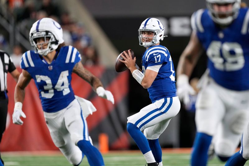 Indianapolis Colts quarterback Kedon Slovis (17) throws a pass during the second half of a preseason NFL football game against the Cincinnati Bengals, Thursday, Aug. 22, 2024, in Cincinnati. (AP Photo/Carolyn Kaster)