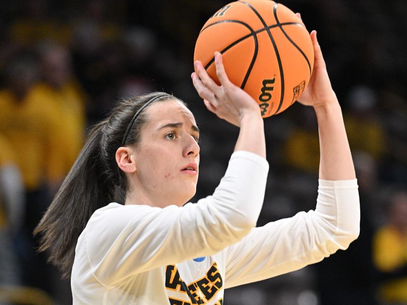 Mar 25, 2024; Iowa City, IA, USA; Iowa Hawkeyes guard Caitlin Clark (22) warms up before the game against the West Virginia Mountaineers during the NCAA second round game at Carver-Hawkeye Arena. Mandatory Credit: Jeffrey Becker-USA TODAY Sports