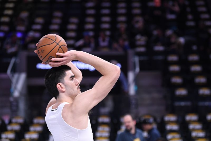 SAN FRANCISCO, CA - NOVEMBER 15: Zach Edey #14 of the Memphis Grizzlies warms up before the game against the Golden State Warriors during the Emirates NBA Cup game on November 15, 2024 at Chase Center in San Francisco, California. NOTE TO USER: User expressly acknowledges and agrees that, by downloading and or using this photograph, user is consenting to the terms and conditions of Getty Images License Agreement. Mandatory Copyright Notice: Copyright 2024 NBAE (Photo by Noah Graham/NBAE via Getty Images)