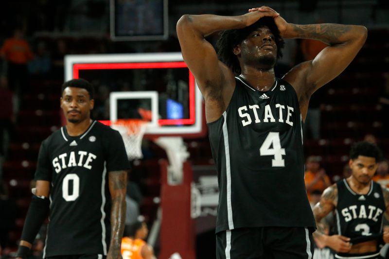 Jan 17, 2023; Starkville, Mississippi, USA; Mississippi State Bulldogs guard/forward Cameron Matthews (4) reacts as he walks off the court after being defeated by the Tennessee Volunteers at Humphrey Coliseum. Mandatory Credit: Petre Thomas-USA TODAY Sports