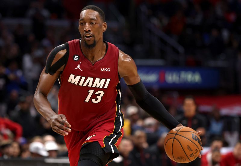 LOS ANGELES, CALIFORNIA - JANUARY 02: Bam Adebayo #13 of the Miami Heat brings the ball up court during the fourth quarter against the Los Angeles Clippers at Crypto.com Arena on January 02, 2023 in Los Angeles, California. NOTE TO USER: User expressly acknowledges and agrees that, by downloading and or using this photograph, User is consenting to the terms and conditions of the Getty Images License Agreement. (Photo by Katelyn Mulcahy/Getty Images)