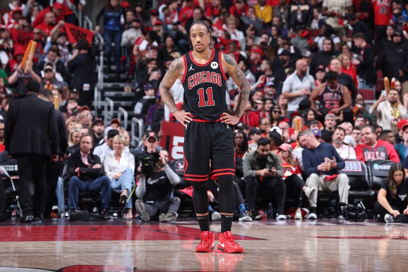 CHICAGO, IL - APRIL 17:  DeMar DeRozan #11 of the Chicago Bulls looks on during the game against the Atlanta Hawks during the 2024 Play-In Tournament  on April 17, 2024 at United Center in Chicago, Illinois. NOTE TO USER: User expressly acknowledges and agrees that, by downloading and or using this photograph, User is consenting to the terms and conditions of the Getty Images License Agreement. Mandatory Copyright Notice: Copyright 2024 NBAE (Photo by Jeff Haynes/NBAE via Getty Images)