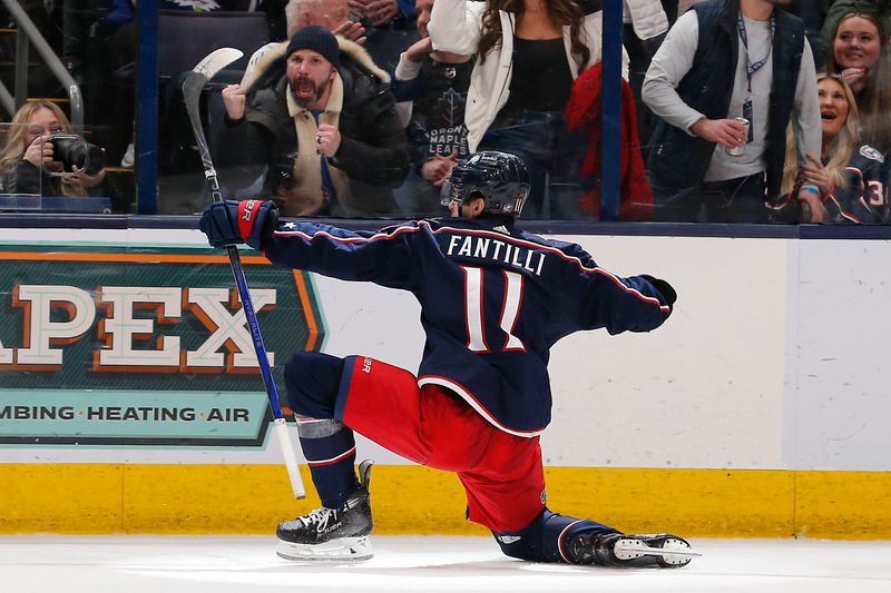 Dec 29, 2023; Columbus, Ohio, USA; Columbus Blue Jackets center Adam Fantilli (11) celebrates his goal against the Toronto Maple Leafs during the third period at Nationwide Arena. Mandatory Credit: Russell LaBounty-USA TODAY Sports