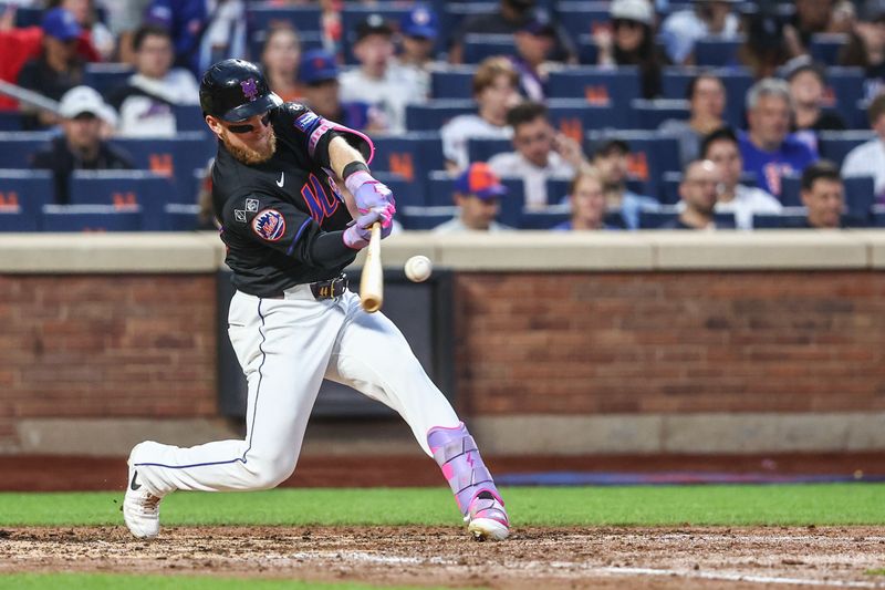 Jul 12, 2024; New York City, New York, USA;  New York Mets center fielder Harrison Bader (44) hits a two run home run in the fourth inning against the Colorado Rockies at Citi Field. Mandatory Credit: Wendell Cruz-USA TODAY Sports