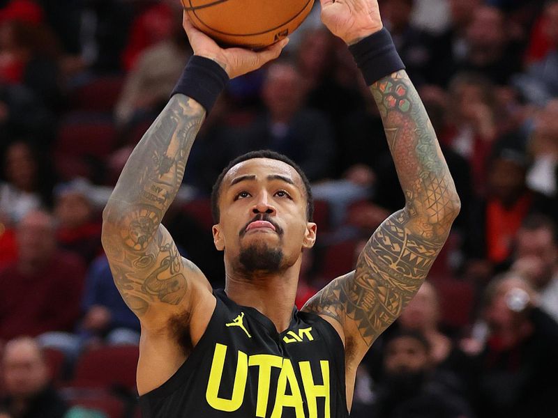 CHICAGO, ILLINOIS - NOVEMBER 06: John Collins #20 of the Utah Jazz shoots a three pointer against the Chicago Bulls during the second half at the United Center on November 06, 2023 in Chicago, Illinois. NOTE TO USER: User expressly acknowledges and agrees that, by downloading and or using this photograph, User is consenting to the terms and conditions of the Getty Images License Agreement. (Photo by Michael Reaves/Getty Images)