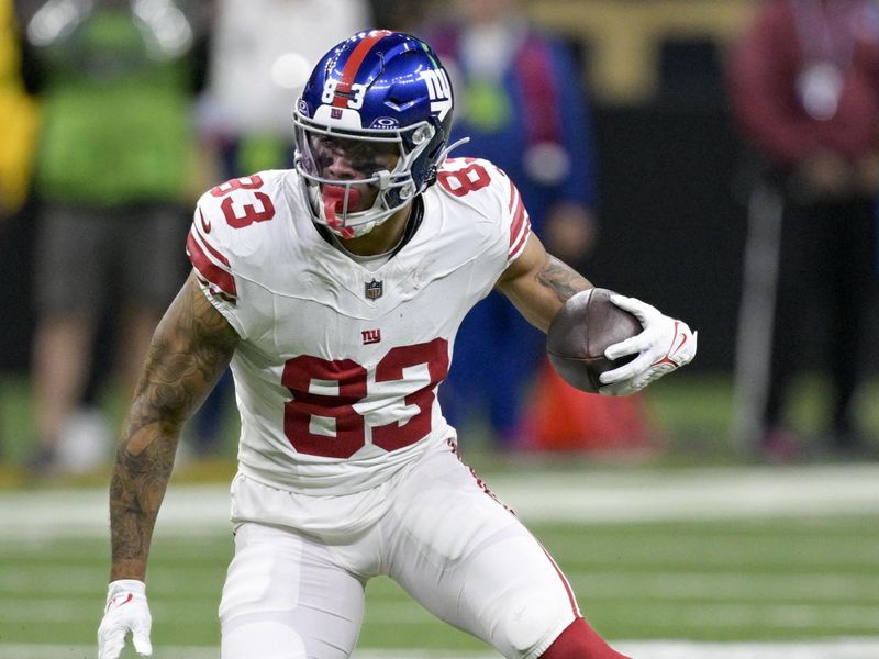 New York Giants tight end Lawrence Cager (83) runs during an NFL football game against the New Orleans Saints in New Orleans, Sunday, Dec. 17, 2023. (AP Photo/Matthew Hinton)