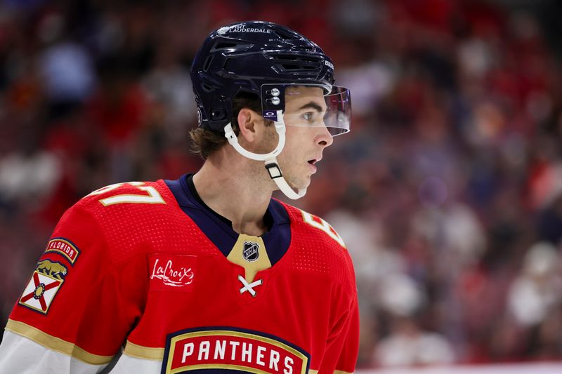 Jan 15, 2024; Sunrise, Florida, USA; Florida Panthers right wing William Lockwood (67) looks on during the first period against the Anaheim Ducks at Amerant Bank Arena. Mandatory Credit: Sam Navarro-USA TODAY Sports