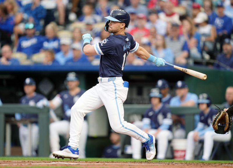 Aug 9, 2024; Kansas City, Missouri, USA; Kansas City Royals second baseman Michael Massey (19) hits a single during the first inning against the St. Louis Cardinals at Kauffman Stadium. Mandatory Credit: Jay Biggerstaff-USA TODAY Sports