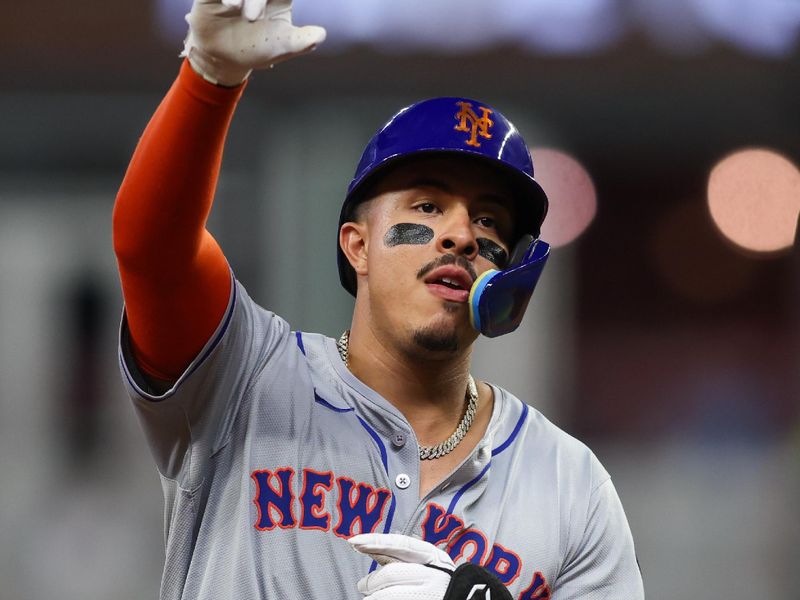 Sep 24, 2024; Atlanta, Georgia, USA; New York Mets third baseman Mark Vientos (27) celebrates after a home run against the Atlanta Braves in the seventh inning at Truist Park. Mandatory Credit: Brett Davis-Imagn Images