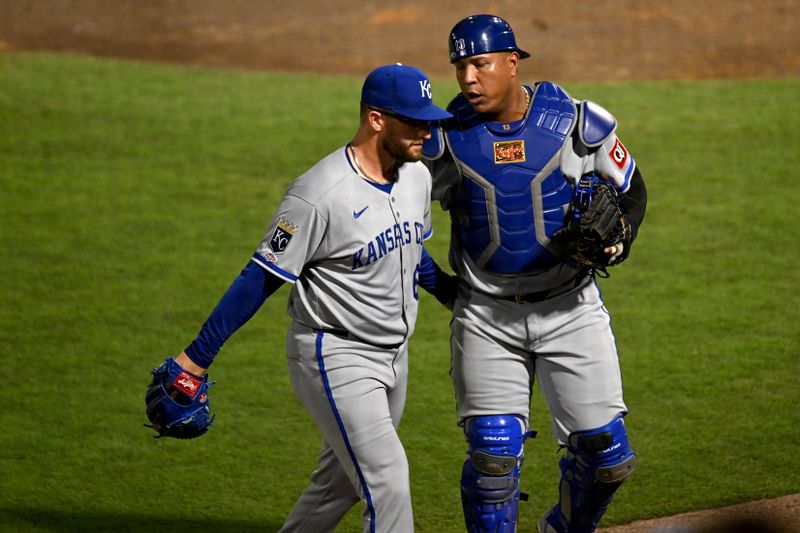 Apr 30, 2025; St. Petersburg, Florida, USA; Kansas City Royals starting pitcher Noah Cameron (65) talks with catcher Salvador Perez (13) after the sixth inning against the Tampa Bay Rays at George M. Steinbrenner Field. Mandatory Credit: Jonathan Dyer-Imagn Images
